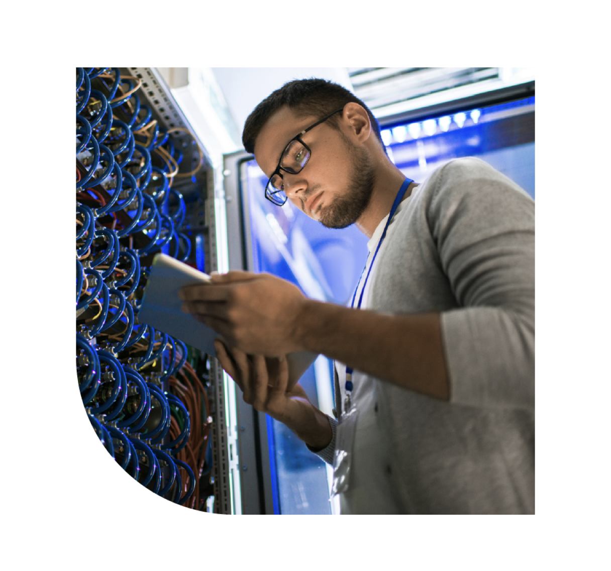 A IT technician at the server room troubleshooting